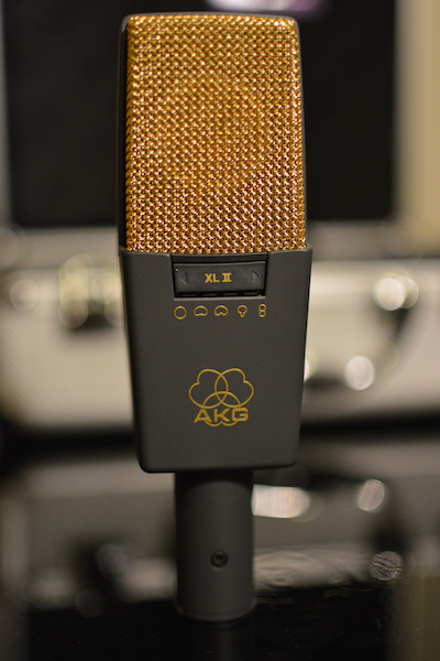 a microphone into guitar amp